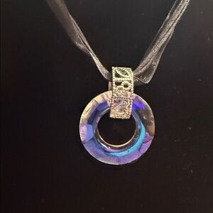 Iridescent Blue Circle Pendant Necklace with Silver Accent